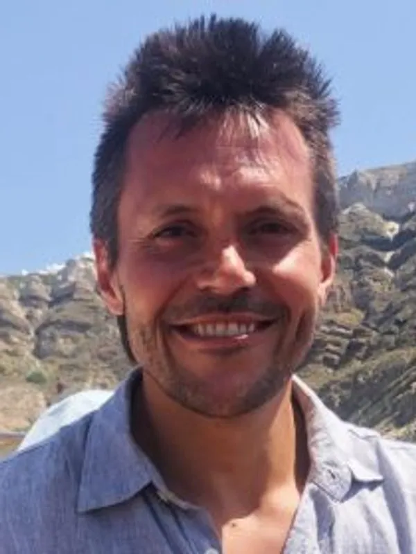 Headshot of Tony Yates.