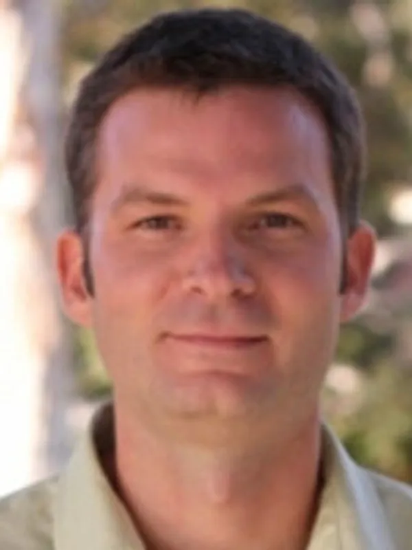 Headshot of Gregson Schachner.