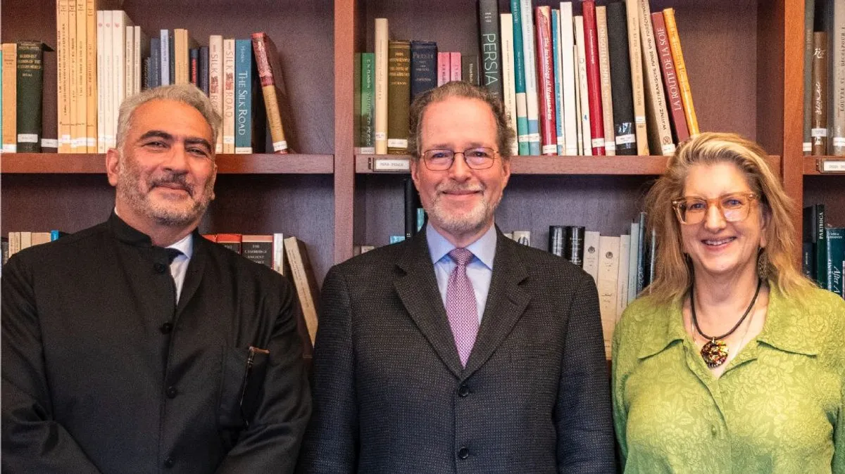 Alumnus Jeffrey Cunard (center) with Professor Rahim Shayegan and Dean Alexandra Minna Stern.