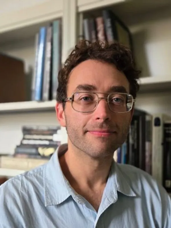 Headshot of David Schneller.