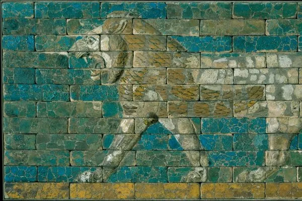 Babylonian blue and gold ceramic panel depicting a lion.