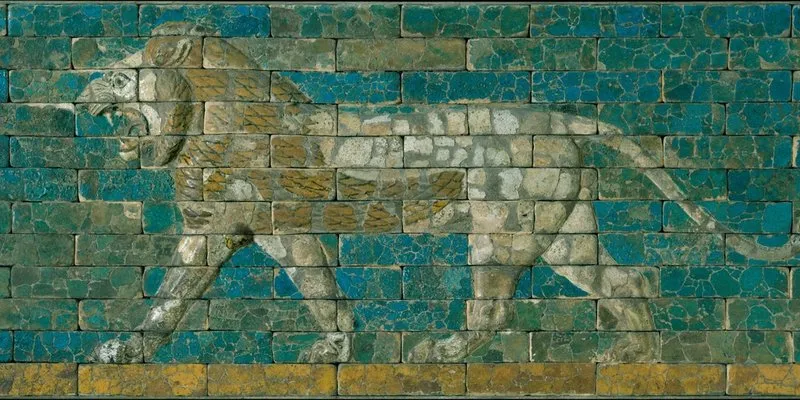 Babylonian blue and gold ceramic panel depicting a lion.