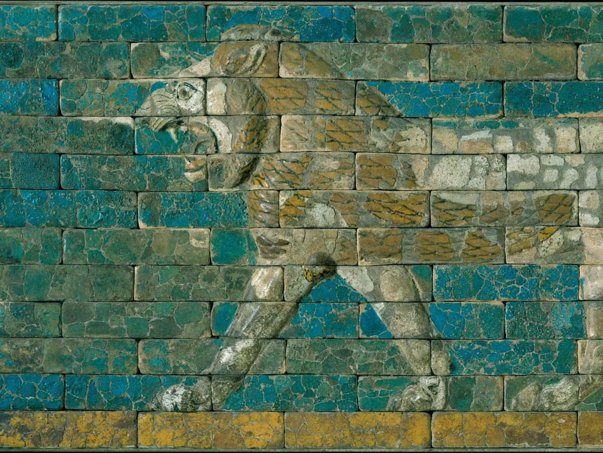 Babylonian blue and gold ceramic panel depicting a lion.