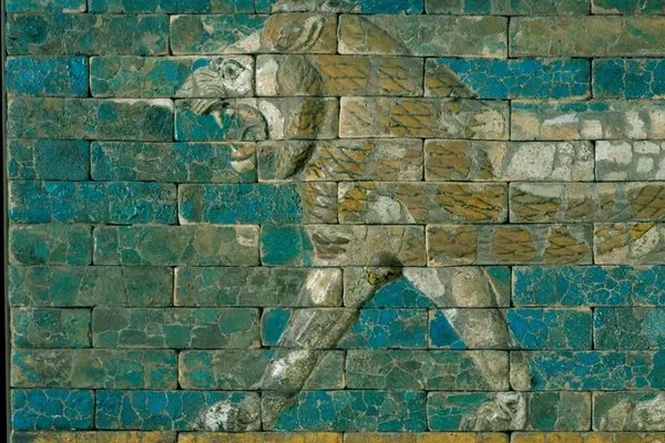 Babylonian blue and gold ceramic panel depicting a lion.
