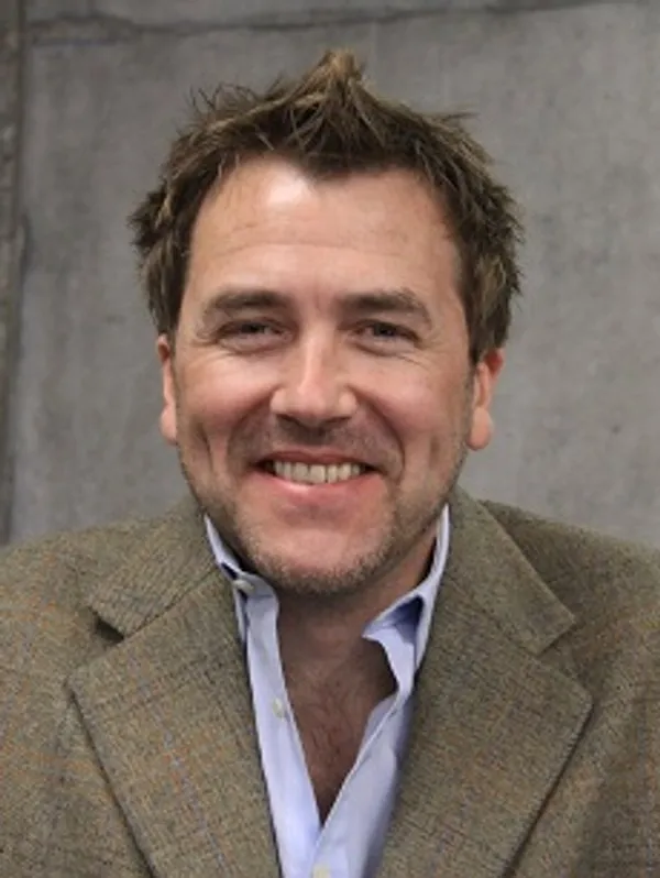 Headshot of Nile Green.