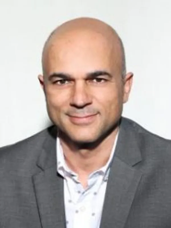 Headshot of Ali Mousavi.